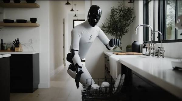 Figure humanoid robot loading a dishwasher in a home kitchen